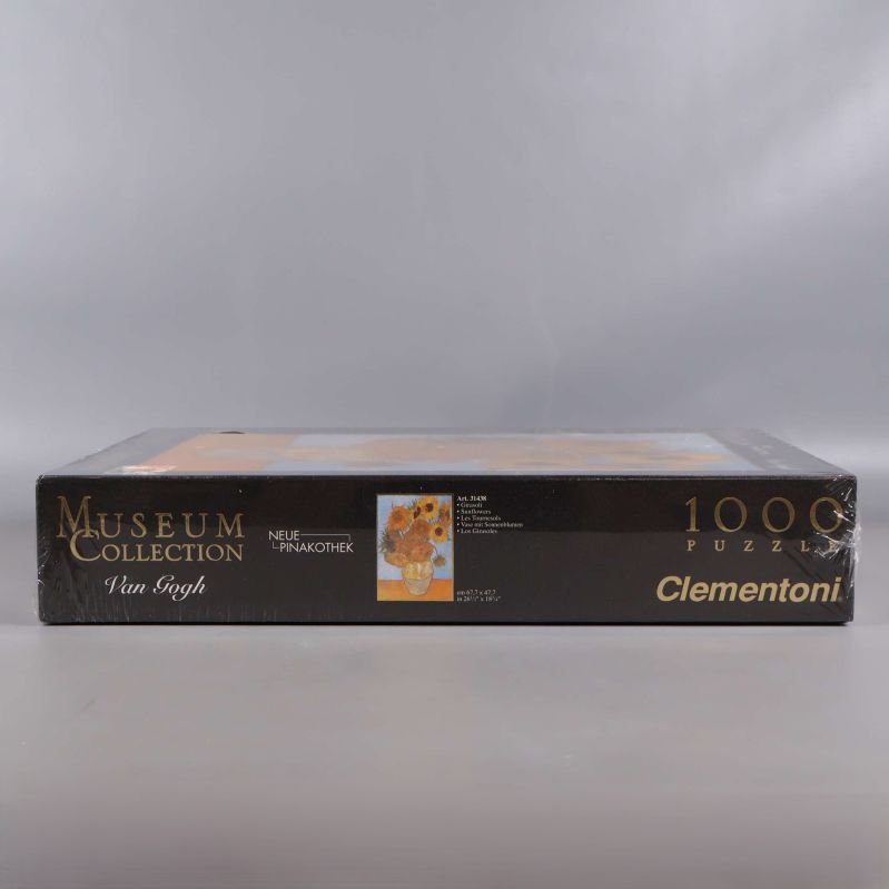 Undersidan av Clementoni puzzel med solrosmotiv