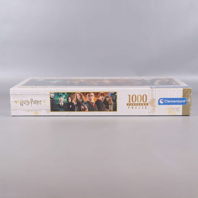 Sidan av pusselbox med Harry Potter-motiv och logotyp