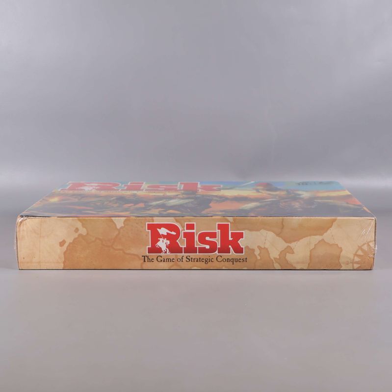 Risk långsida med logotyp och förpackningsdetaljer