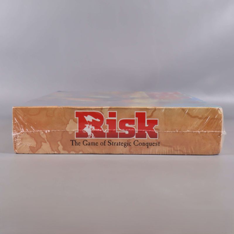 Risk kortsida med logotyp och spelslogan