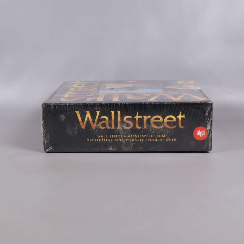 Wallstreet spelask sedd från sidan med text och logotyp