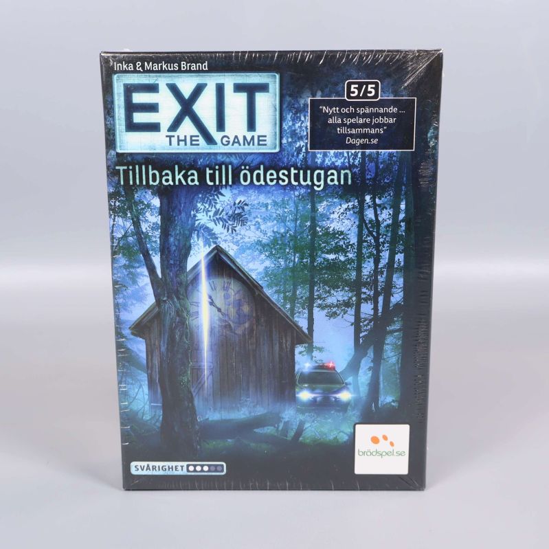 Närbild på framsidan av Exit the Game Tillbaka till ödestugan