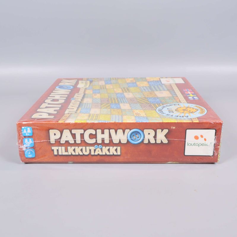 Patchwork spelask från långsidan med symboler