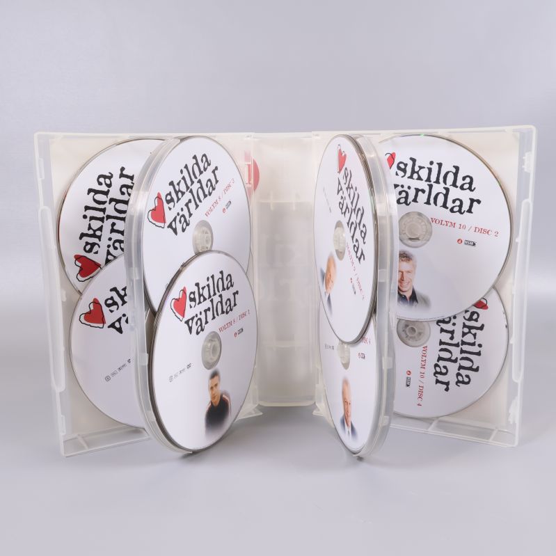 Dvd-boxen Skilda världar del 2 öppen med organiserade skivor