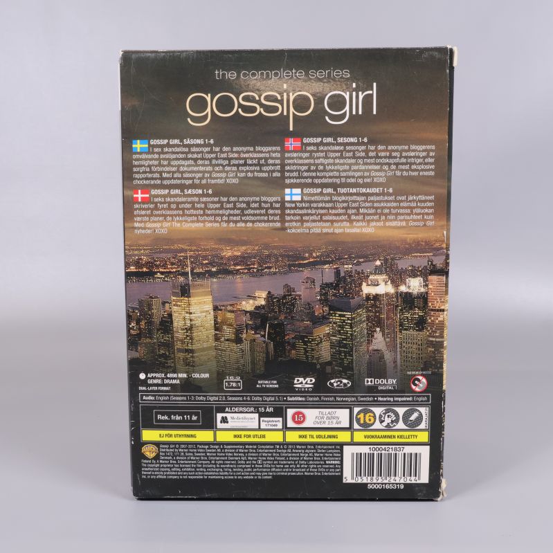 Baksidan av Gossip Girl DVD-box med text och symboler