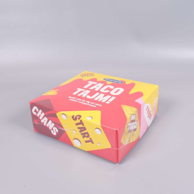 Taco Tajm spelask sedd snett framifrån med startfältmotiv