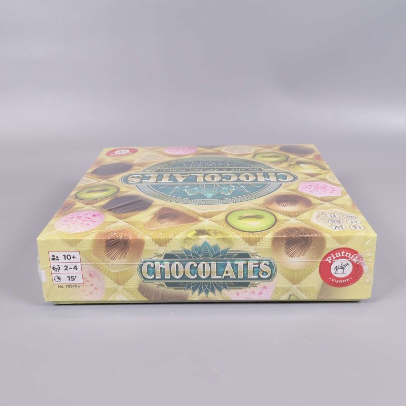 Sidan av Chocolates med spelinformation och röd logga