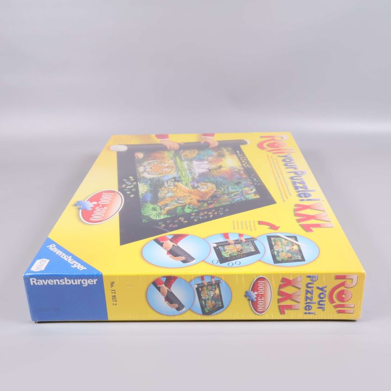 Närbild på sidan av XXL Roll your Puzzle låda