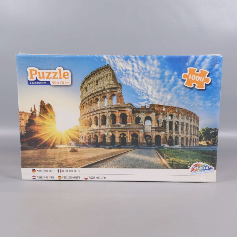 Framsida av pusselbox med Colosseum och 1000 bitar