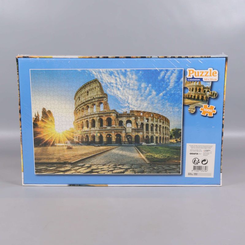 Baksida av pusselbox med färdiglagt pusselfoto Colosseum