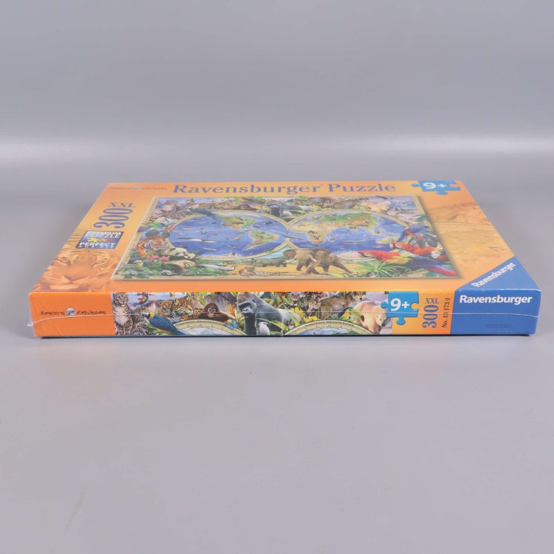Platt vy av pusselask Ravensburger 300 XXL