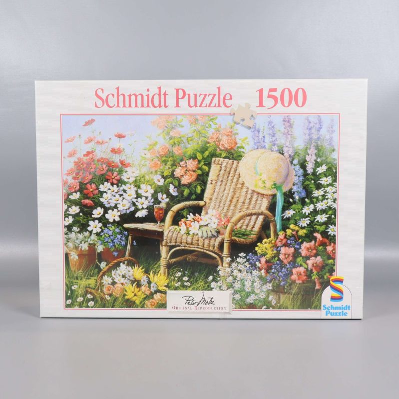 Pussellåda med Schmidt Puzzle och 1500 bitar, trädgårdsmotiv