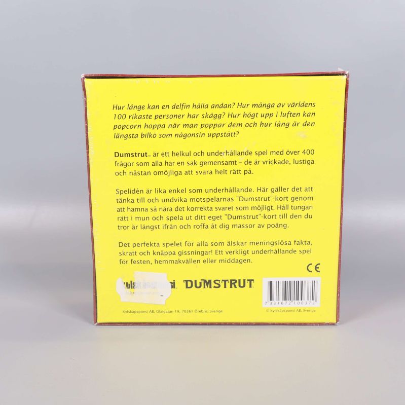 Baksidan av Dumstrut spelet med spelbeskrivning och detaljer