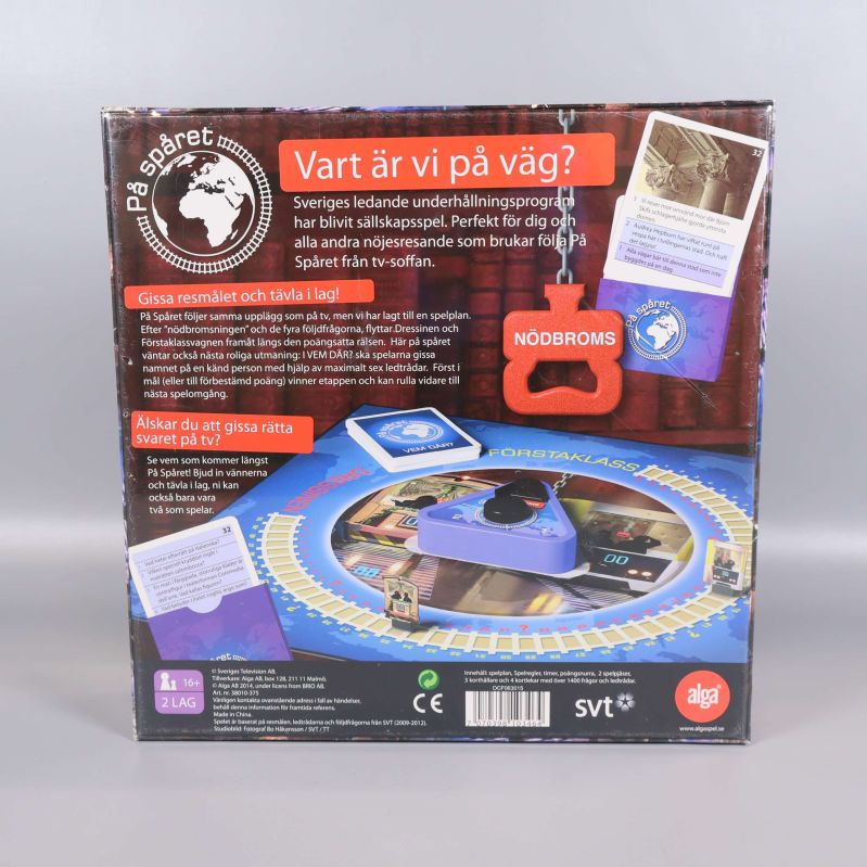 Baksidan av På spåret spelet med speltavla och instruktionstext