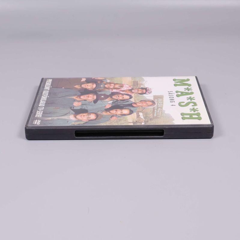 MASH säsong 4 DVD-fodral liggande stängt mot grå bakgrund