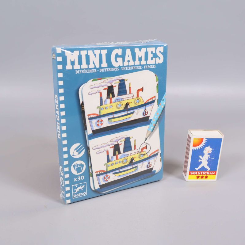 Mini Games ask står bredvid tändsticksask för storleksjämförelse