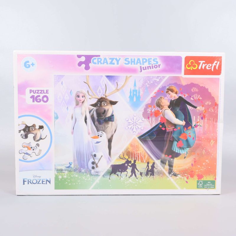 Pussellåda med färgglad Disney-illustration och pusselbitar