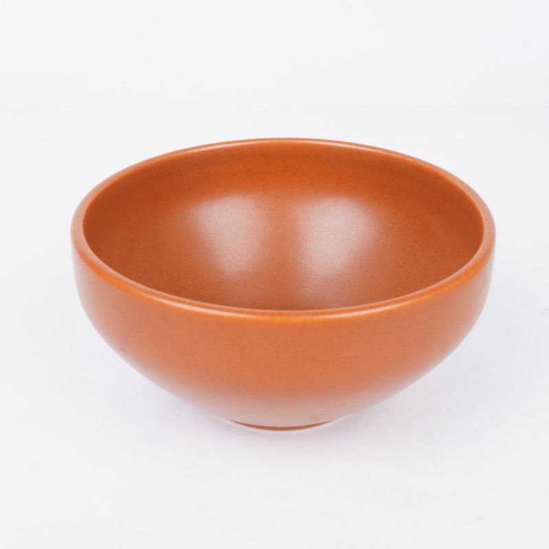 Orange skål i närbild, slät yta
