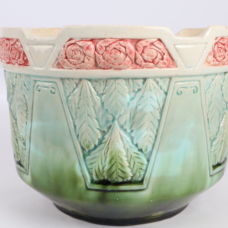 Närbild av bladmönster på krukan