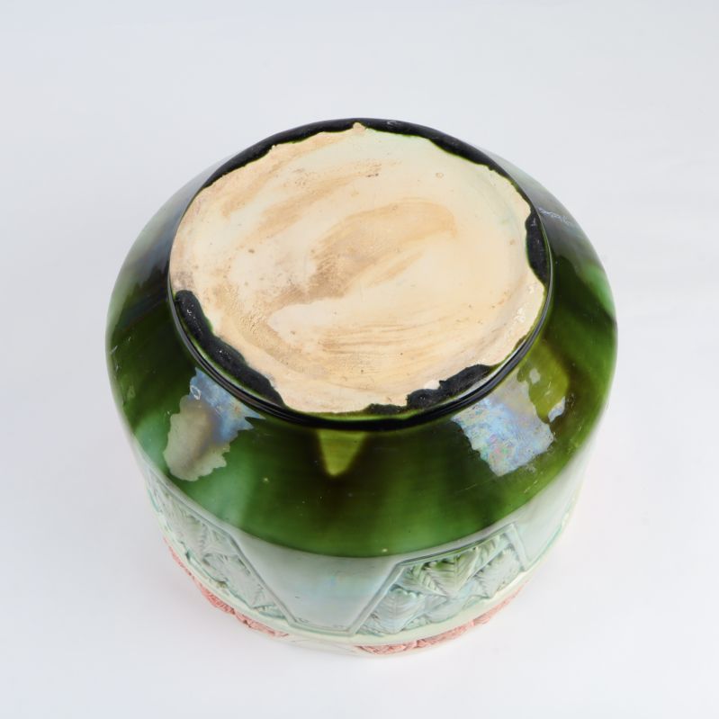 Undersidan av den gröna krukan