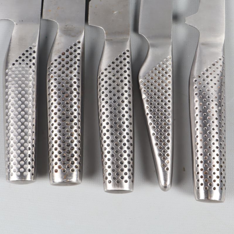 Detaljerade perforerade knivhandtag