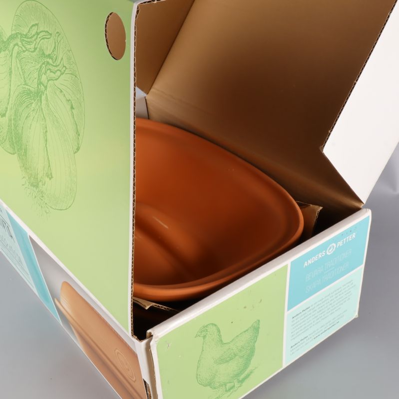 Öppen förpackning med grytan synlig