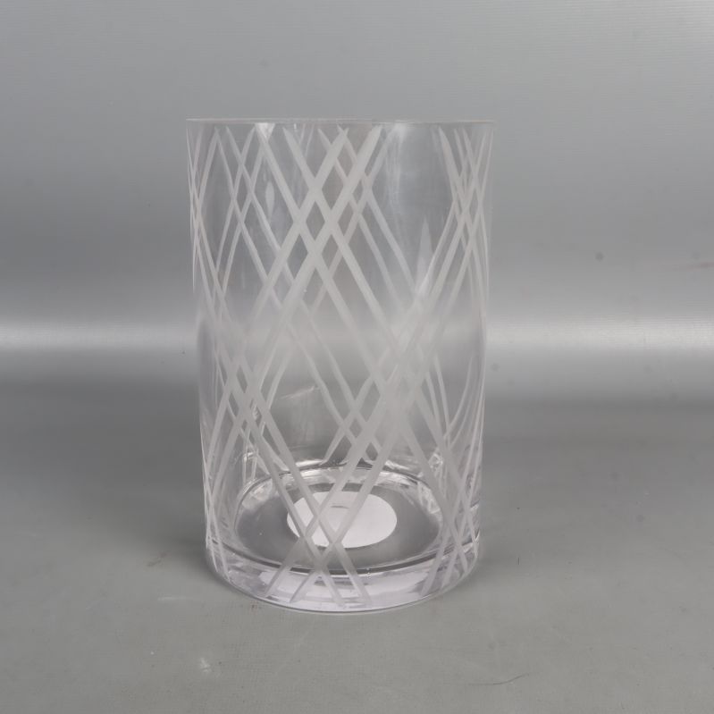 Transparent glasvas med abstrakt mönster