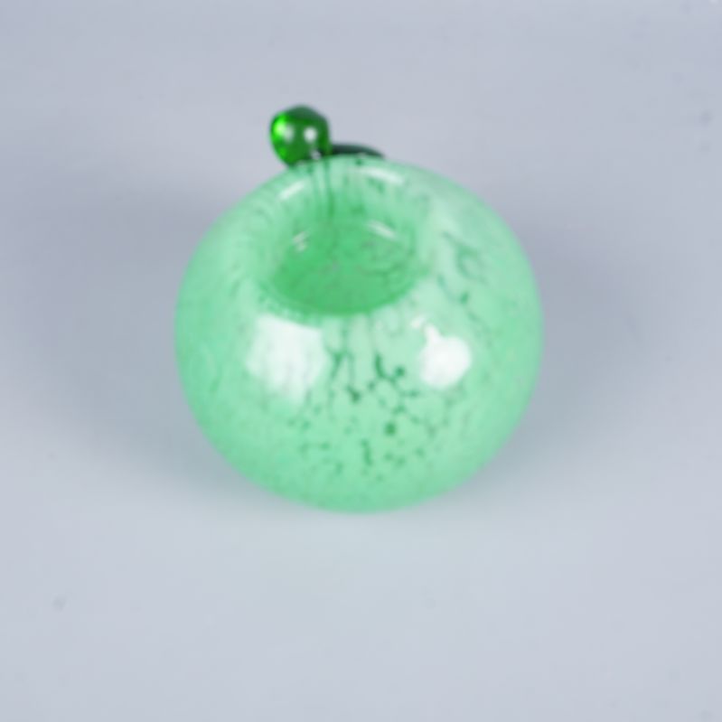 Grön ljusstake ovanifrån visar öppningen