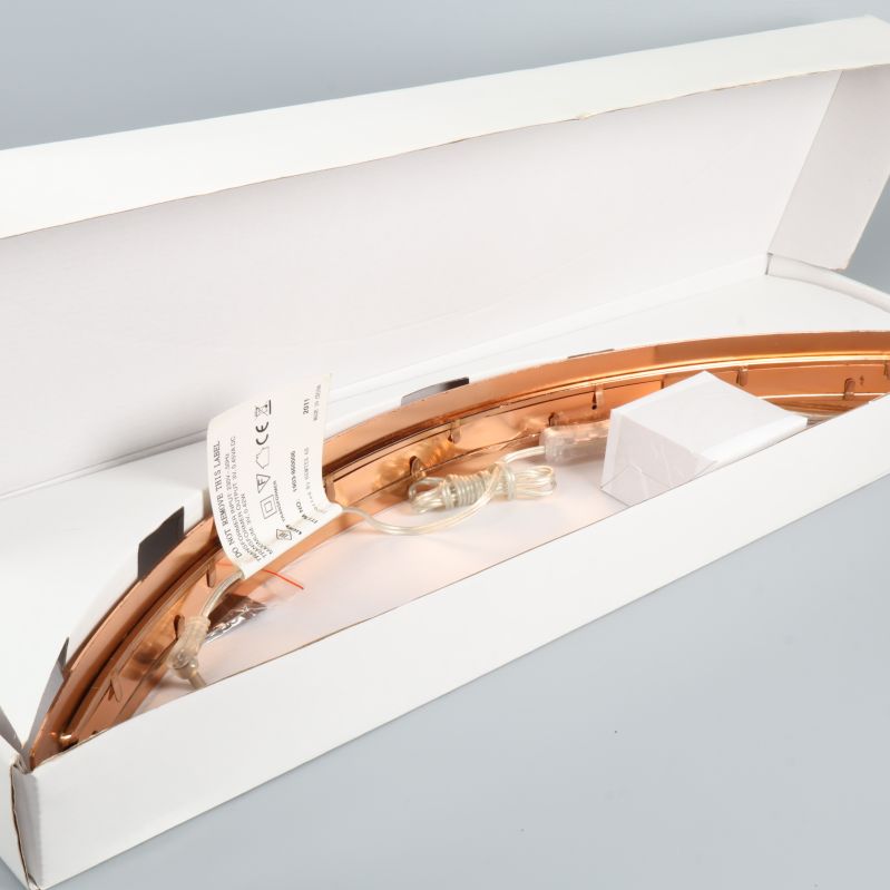 Adventsljusstake nedpackad i vit kartong