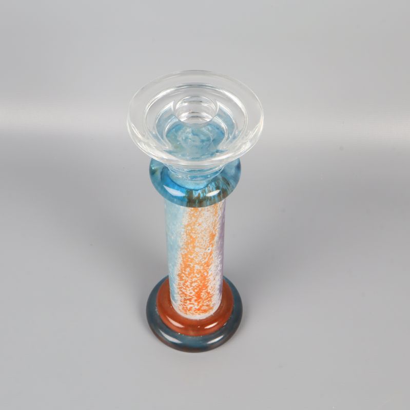 Glasljusstake sedd ovanifrån visar öppning och färg