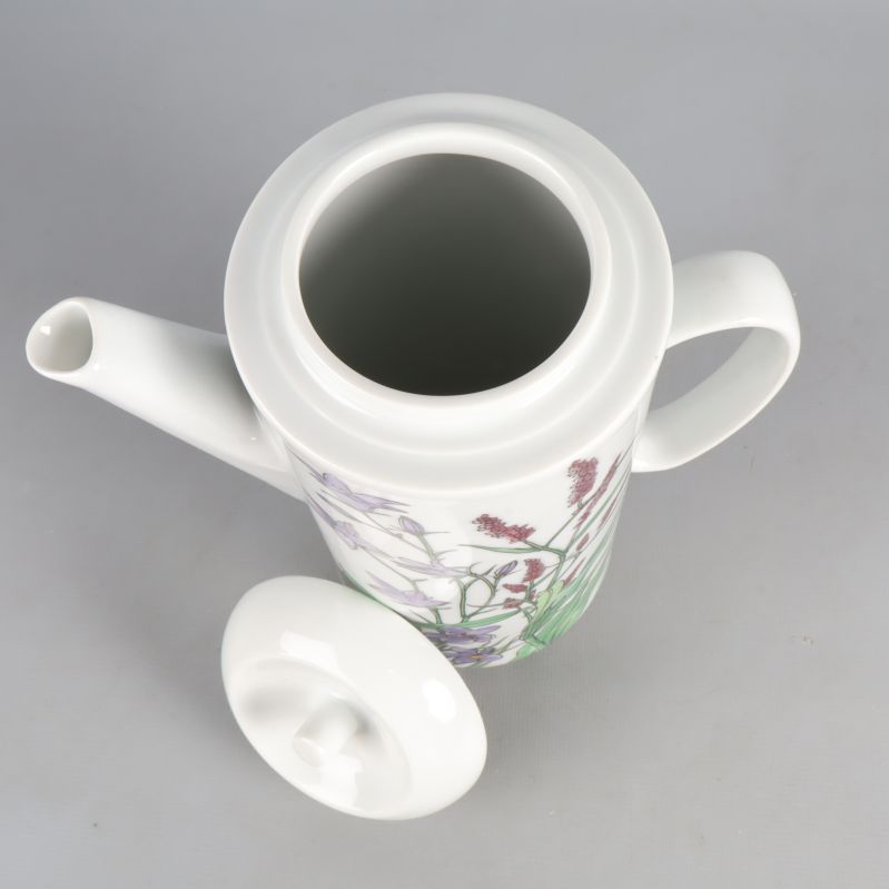 Insidan av kanna med locket avtaget