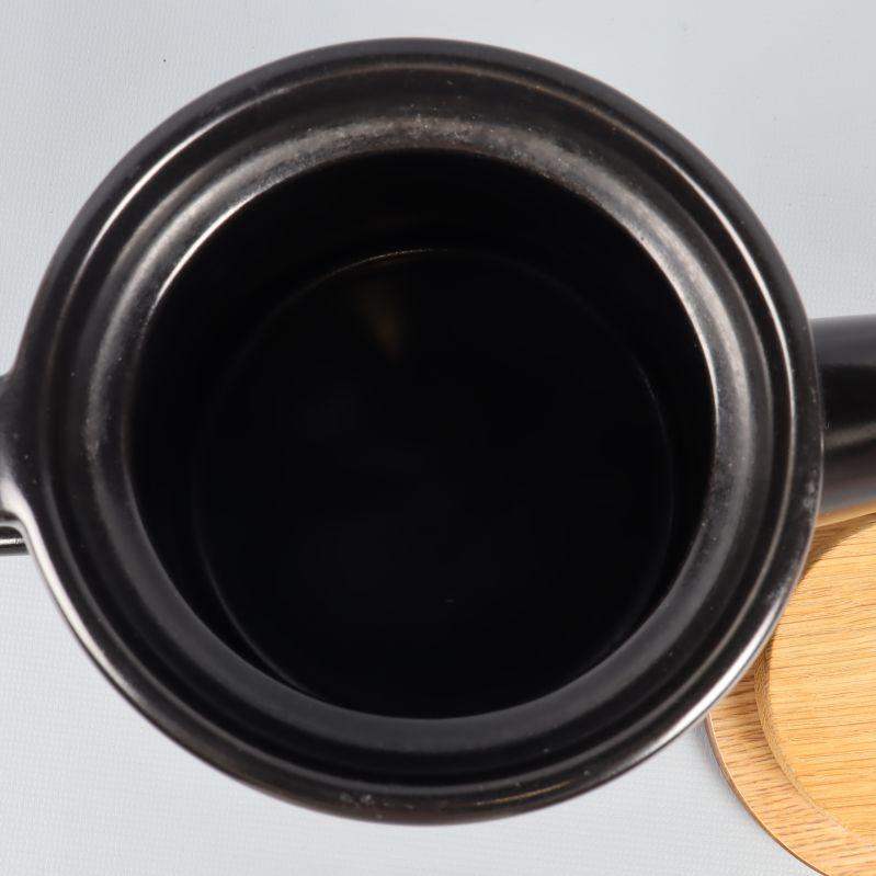 Innerdelen av tekannan i svart keramisk finish