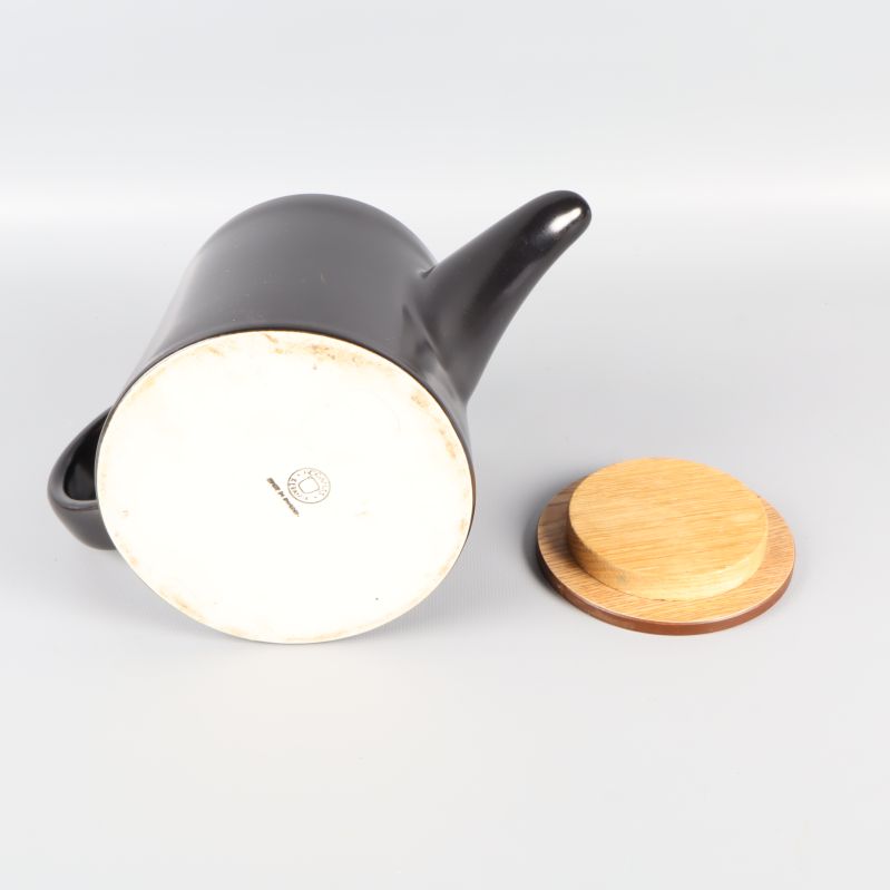 Tekannans botten med stämpel och trälock separat