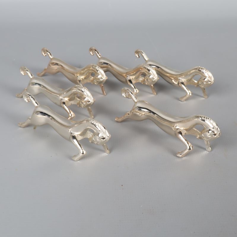 Sex glänsande knivstöd i form av hästar