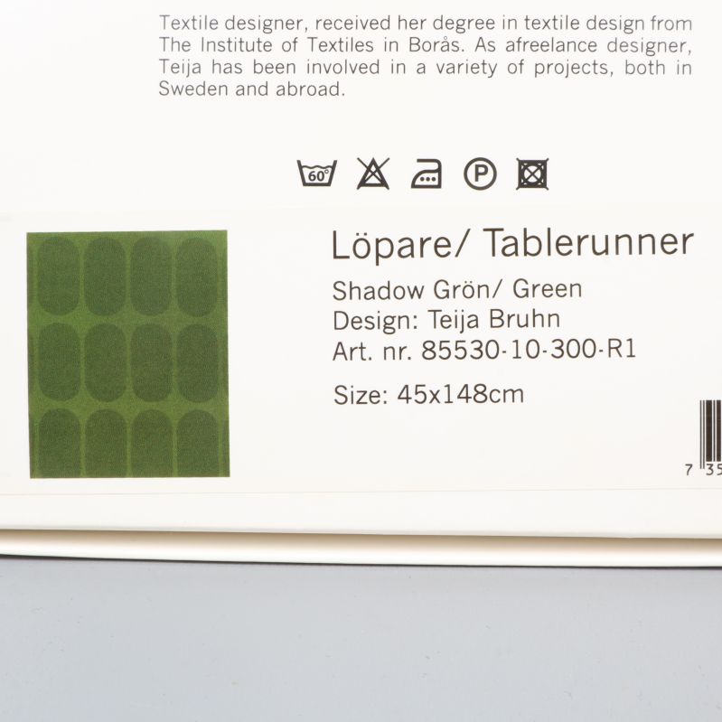 Information om löpare Shadow grön, design Teija Bruhn