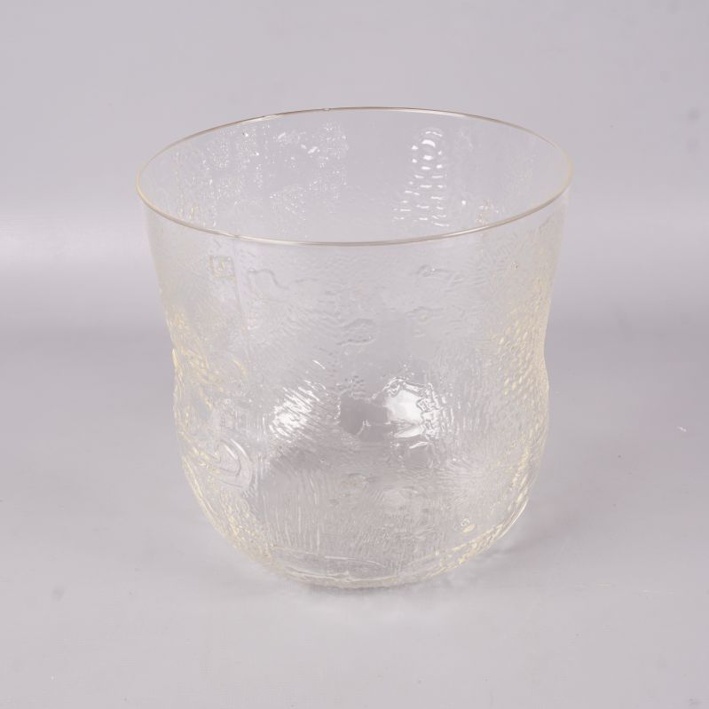 Transparent skål med ojämn struktur och rund form
