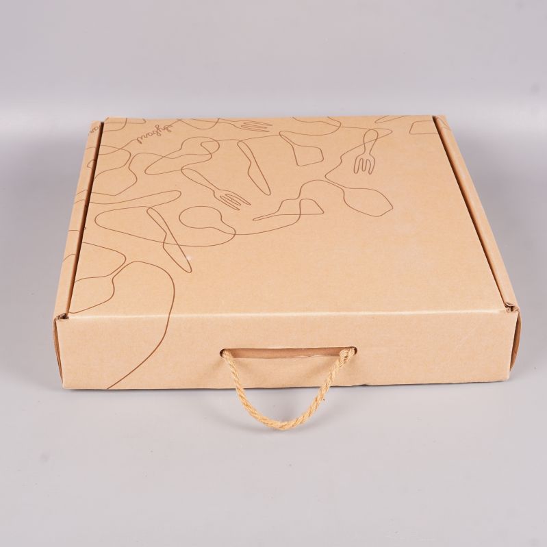 Stängd presentkartong med streckteckningar och rep