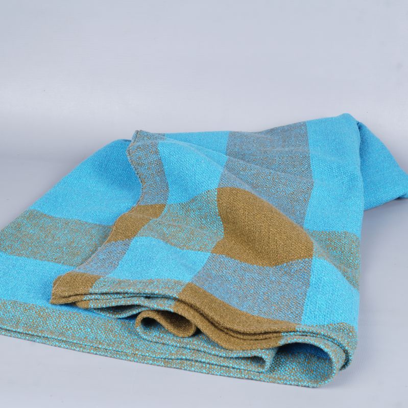Vikt duk med rutigt tyg och synliga blå och bruna rutor