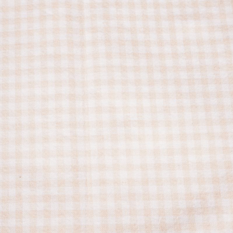 Närbild på småmönstrat rutigt tyg i ljusa färger