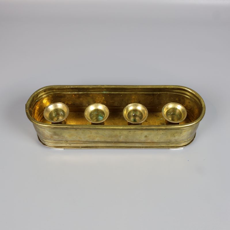 Toppvy av ljusstake med plats för fyra ljus