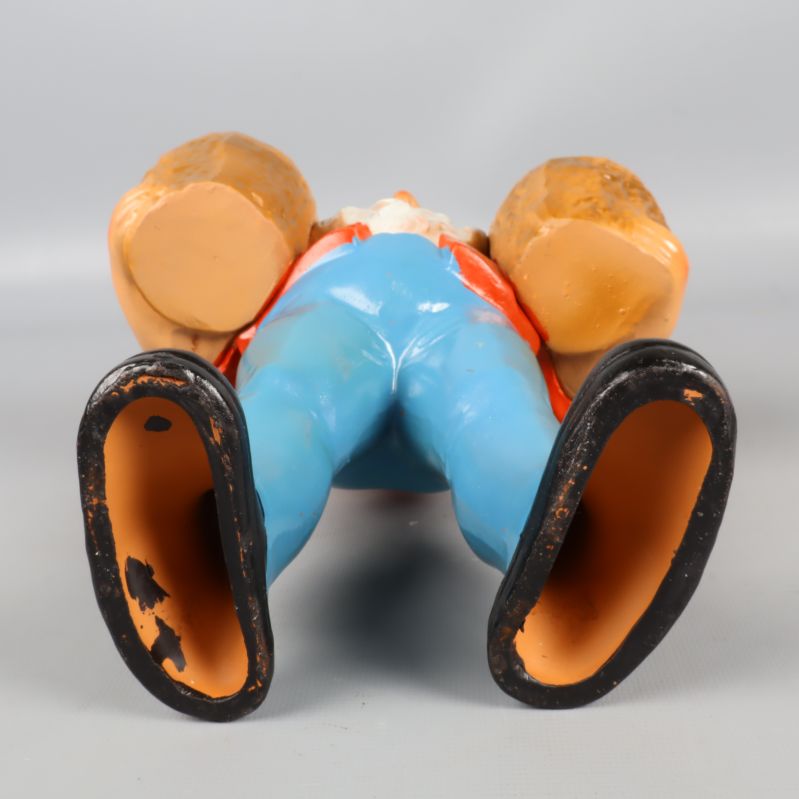 Undersida av tomtefigur