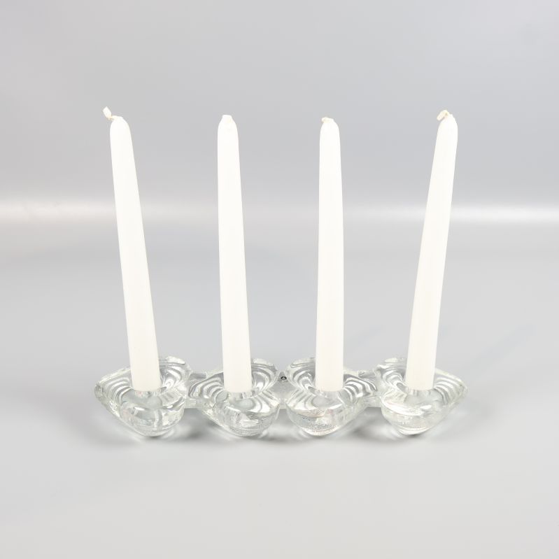Ljusstake i klarglas med fyra vita ljus