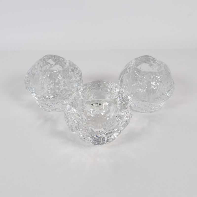 Tre ljushållare i glas, set Snöboll. Sett ovanfrån.