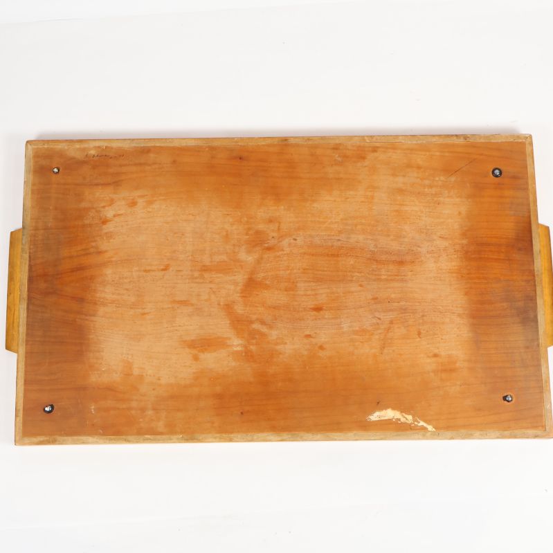 Brickans baksida i trä med fyra fästen