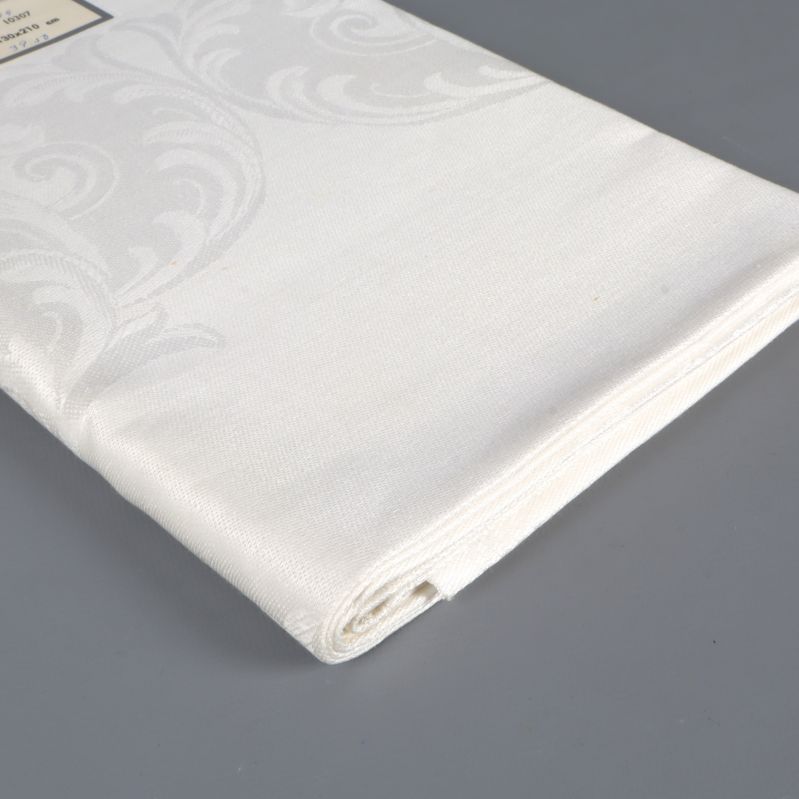 Vikt hellinneduk med synligt hörn och vävt mönster