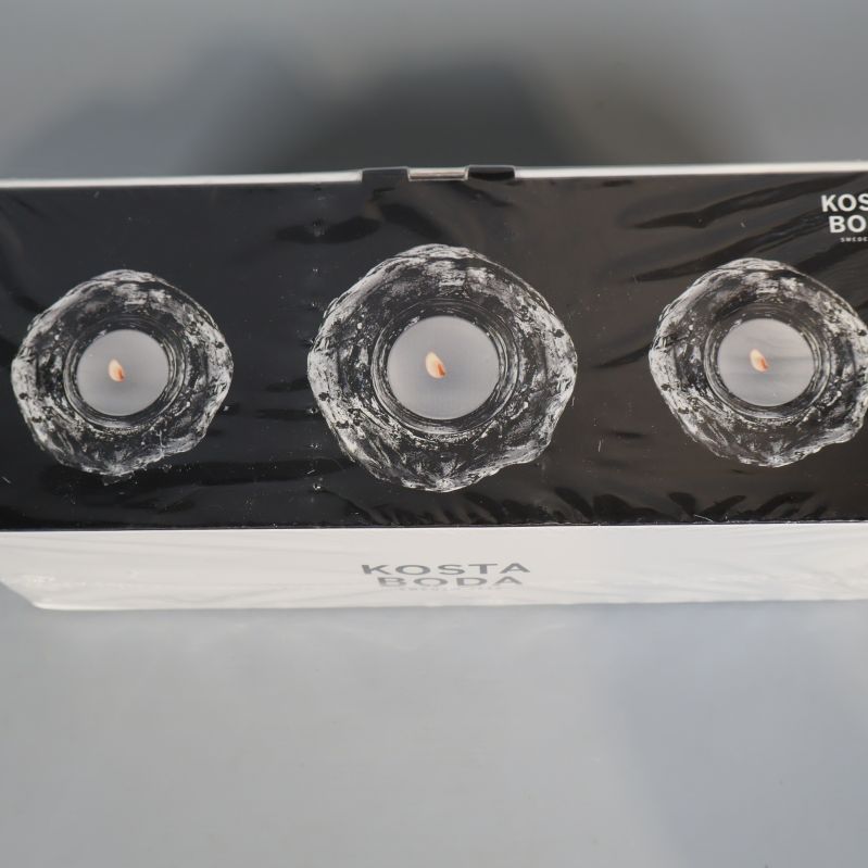 Närbild på tre Snöboll ljusstakar i förpackning