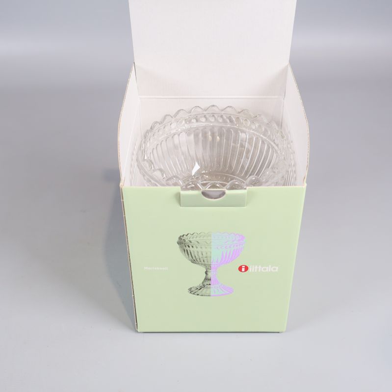 Mariskooli skål placerad i originalkartongen