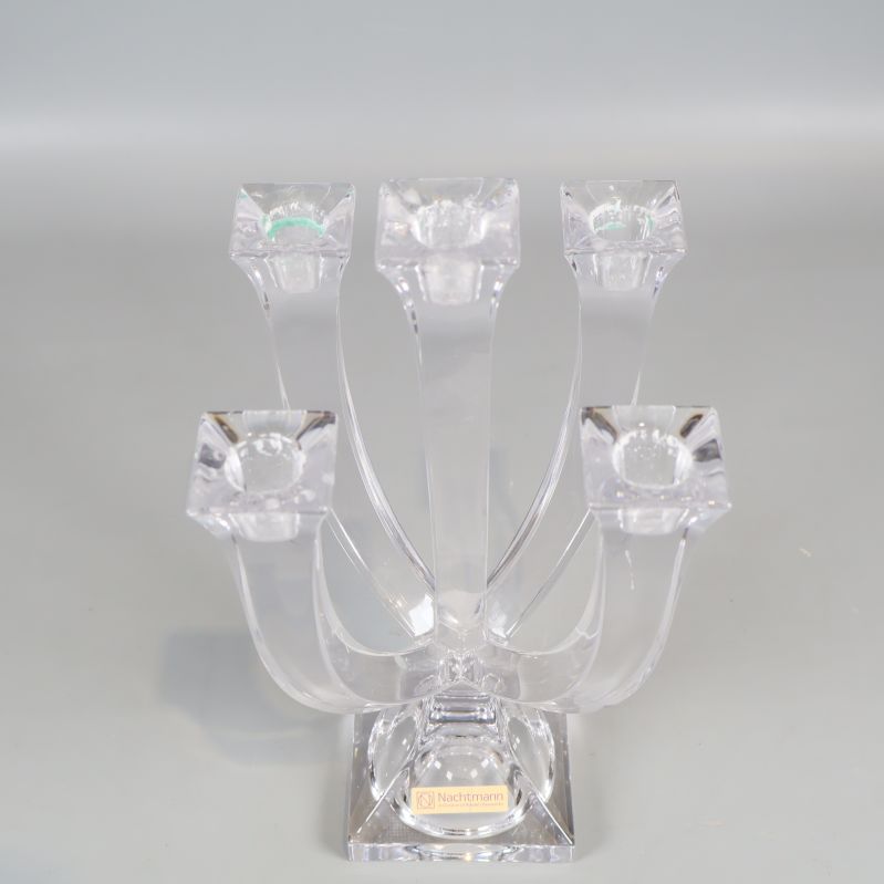 Femarmad kristall-ljusstake sedd uppifrån