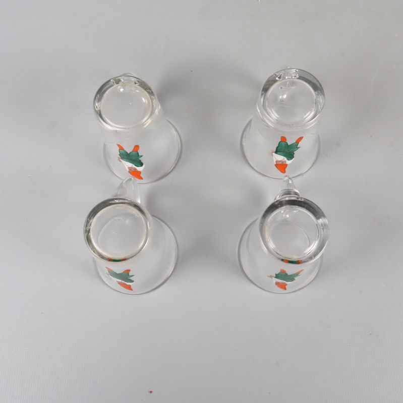 Fyra tomteglas upp-och-ned visade ovanifrån