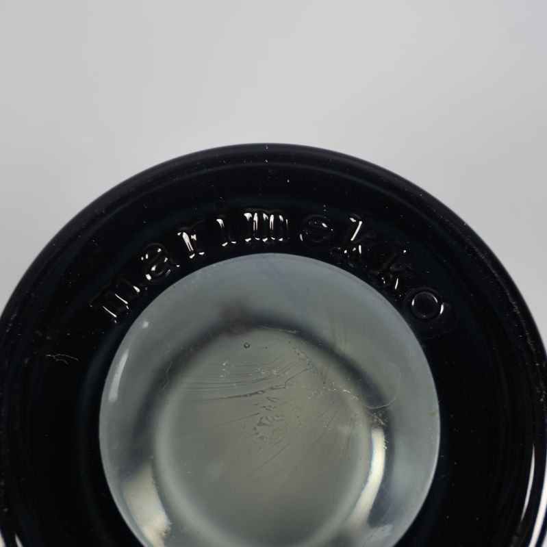 Inpräglad Marimekko-text på lykta